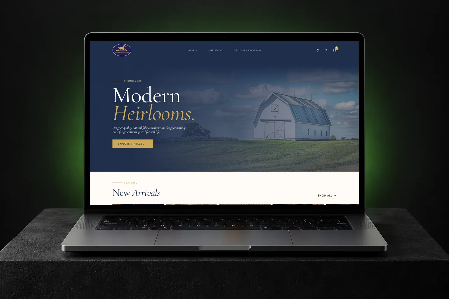 Weathervane Hill Shopify Plus store design: homepage hero with "Modern Heirlooms." in white and gold serif over a white barn in a field | EVDEV